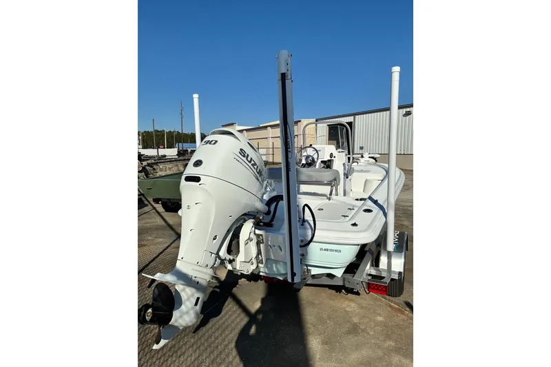 Slide: The Image of 2026 ALK2 Powerboats 17HS with Suzuki outboard motor, parked outdoors. - 4