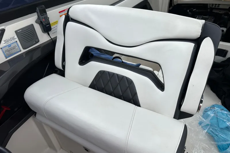Slide: The Image of White leather seat in 2013 Monterey 328SS Super Sport boat interior. - 2