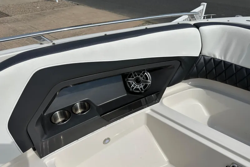 Slide: The Image of Interior of 2013 Monterey 328SS Super Sport boat with speaker and cup holders. - 8