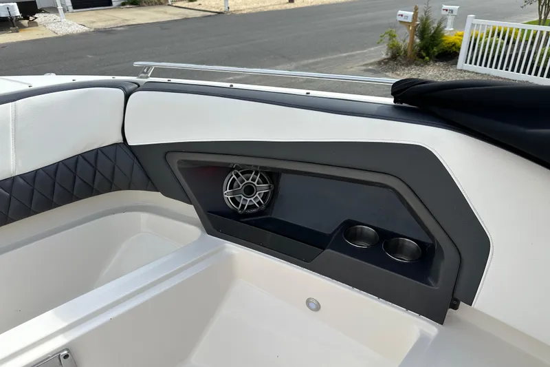 Slide: The Image of Interior of 2013 Monterey 328SS Super Sport boat with speaker and cup holders. - 9