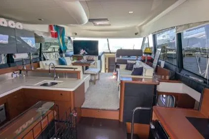 Slide: The Image of Luxurious interior of a 2013 Prestige 550 yacht with elegant seating and decor. - 12