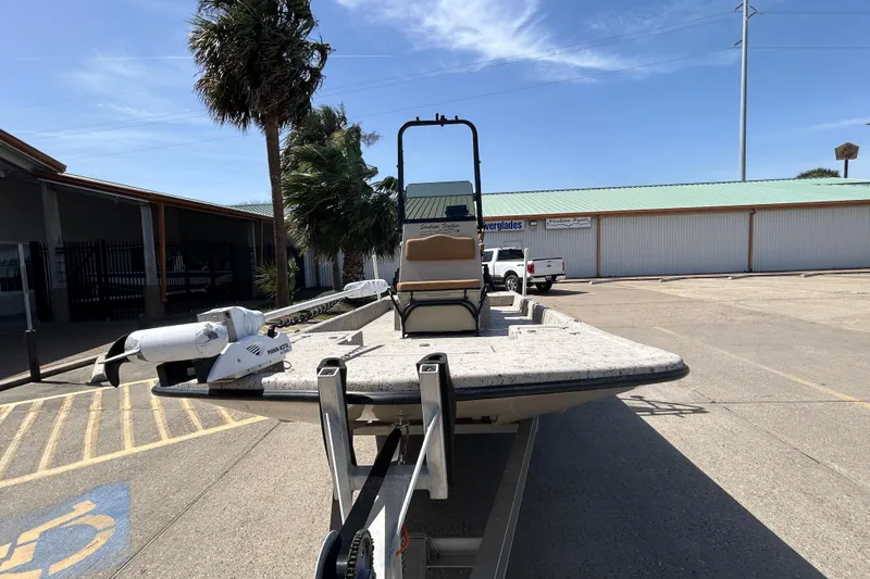 Slide: The Image of 2015 Shallow Stalker Cat 240 Pro boat on trailer in sunny parking lot. - 3