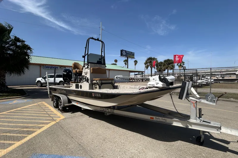 Slide: The Image of 2015 Shallow Stalker Cat 240 Pro boat on trailer, parked outdoors. - 4