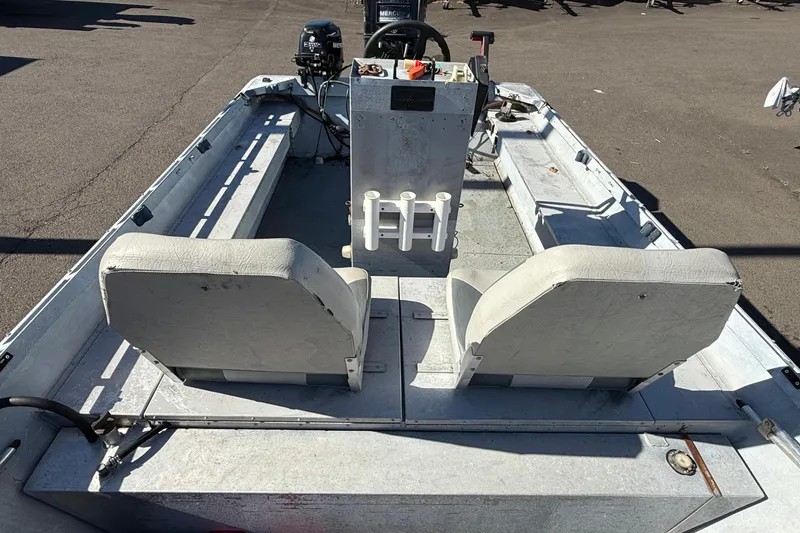 Slide: The Image of 1983 Alumaweld Center Console boat interior with dual seats and steering console. - 8