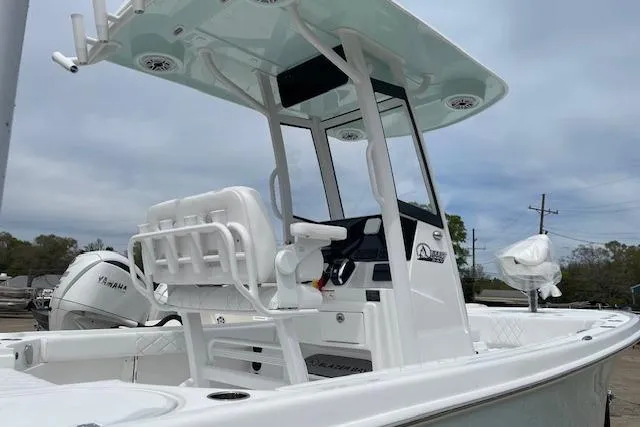 The Image of 2026 Blazer Bay 2440 boat with Yamaha engine, featuring a sleek white design and modern console. - 1