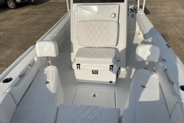 Slide: The Image of 2026 Blazer Bay 2440 boat interior with white seating and diamond stitching. - 11