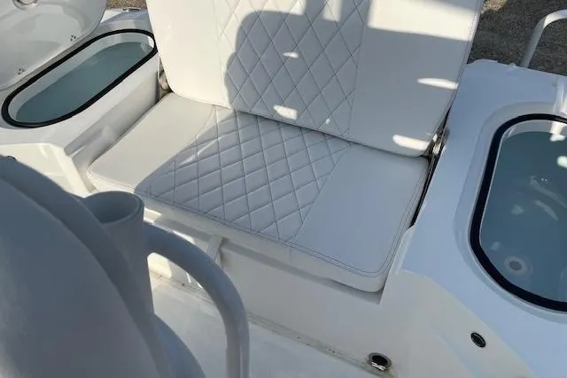 Slide: The Image of White quilted seating on 2026 Blazer Bay 2440 boat, featuring sleek design and modern amenities. - 7
