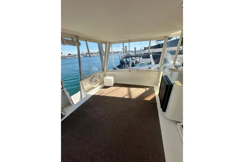 Slide: The Image of Spacious interior of a 1994 Oceans motor yacht with waterfront view. - 27