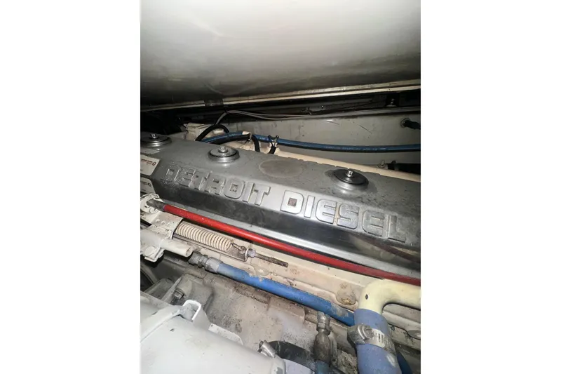 Slide: The Image of Engine compartment of a 1994 Oceans motor yacht featuring a Detroit Diesel engine. - 6