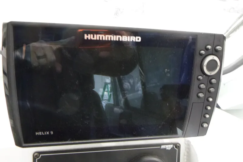 Slide: The Image of Humminbird Helix 9 fish finder on 2025 Hewescraft 240 Ocean Pro boat. - 10