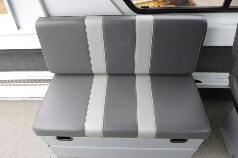 Slide: The Image of Gray and white seat in 2025 Hewescraft 240 Ocean Pro boat interior. - 15