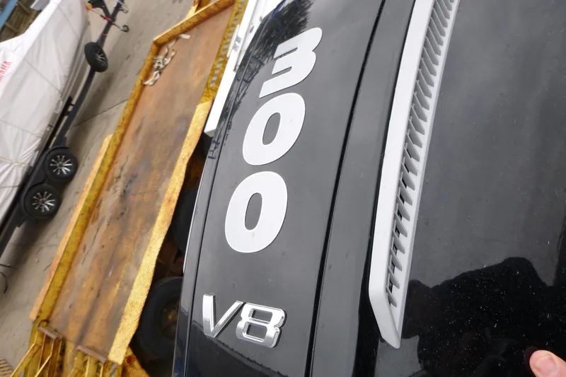 Slide: The Image of Close-up of a 300 V8 engine on a 2025 Hewescraft 240 Ocean Pro boat. - 19