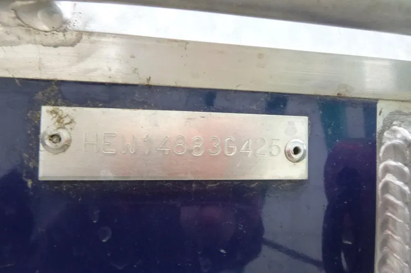 Slide: The Image of Hewescraft 240 Ocean Pro 2025 boat identification plate with serial number. - 22