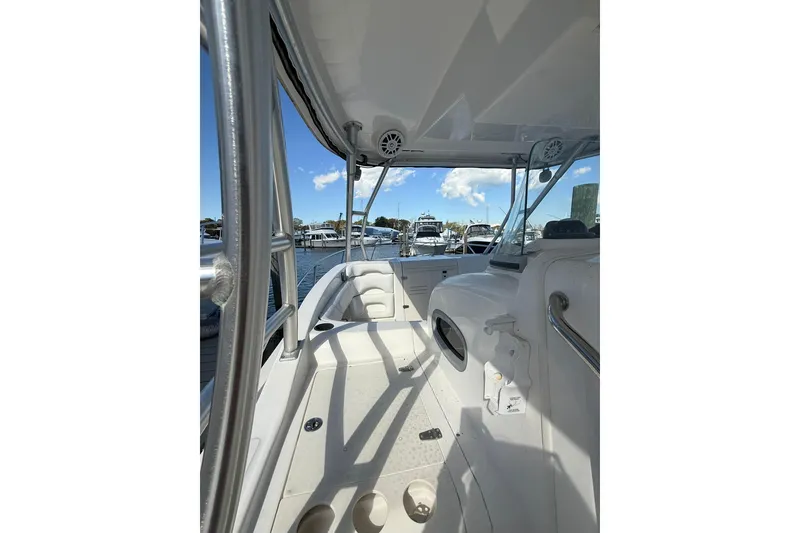 Slide: The Image of 2007 Boston Whaler 320 Outrage Cuddy Cabin interior view at marina. - 12