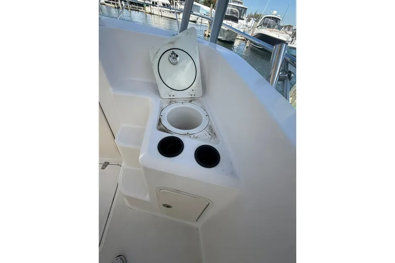 Slide: The Image of 2007 Boston Whaler 320 Outrage Cuddy Cabin boat interior with storage compartment. - 29