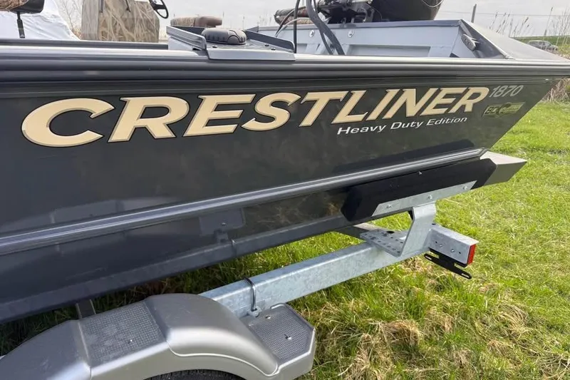 Slide: The Image of 2026 Crestliner 1870 Retriever FCC boat, heavy-duty edition, on a trailer. - 10