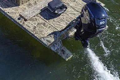 Slide: The Image of Manufacturer Provided Image: 2026 Crestliner 1870 Retriever FCC boat with camo design and powerful outboard motor. - 4