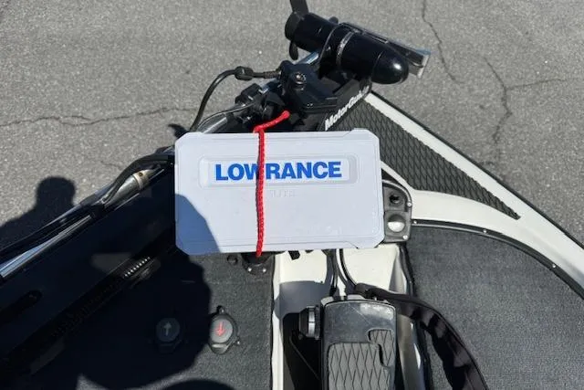 Slide: The Image of 2004 Triton Tr-186 SC boat with Lowrance fishfinder on deck. - 14