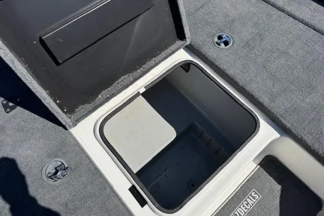 Slide: The Image of Open storage compartment on 2004 Triton Tr-186 SC boat deck. - 16