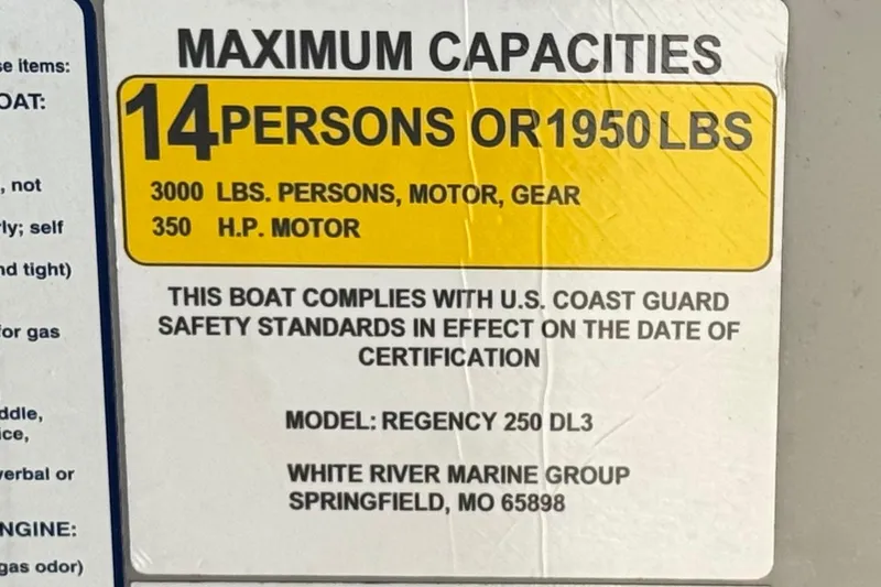 Slide: The Image of 2023 Regency 250 DL3 capacity label: 14 persons or 1950 lbs, 350 HP motor. - 36