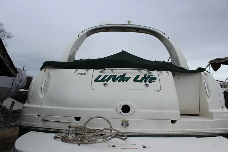 Slide: The Image of 2005 Sea Ray Sundancer 280 boat with "Luvin Life" text on the stern. - 3