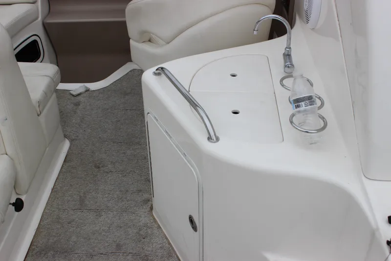 Slide: The Image of Interior of 2005 Sea Ray Sundancer 280 with seating and sink area. - 8
