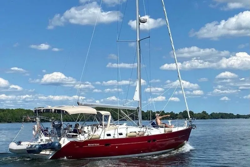 The Image of 2005 Beneteau Oceanis Clipper 423 sailing on a sunny day with clear skies. - 0