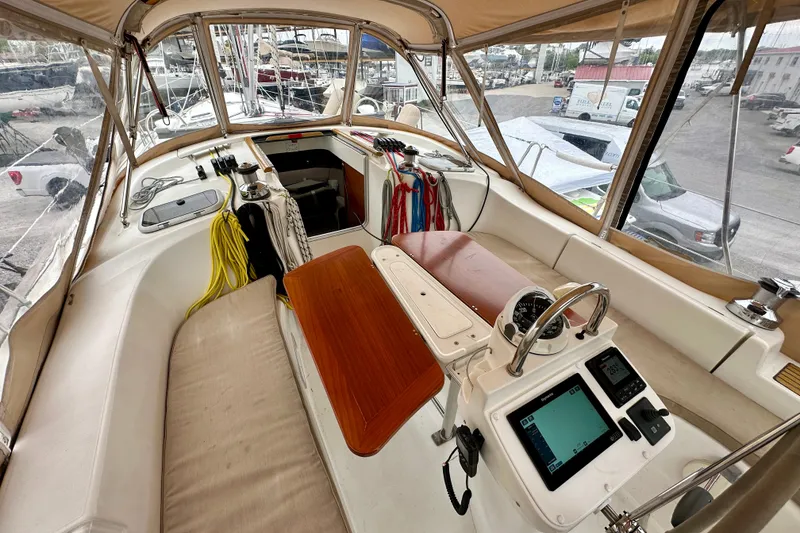 Slide: The Image of Cockpit of 2005 Beneteau Oceanis Clipper 423 sailboat with navigation instruments. - 10