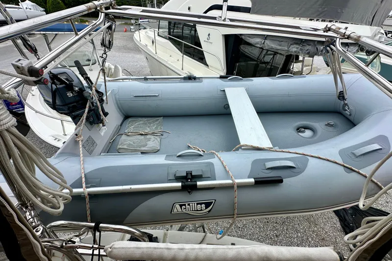 Slide: The Image of Inflatable dinghy on Beneteau Oceanis Clipper 423, 2005 model, with outboard motor. - 24