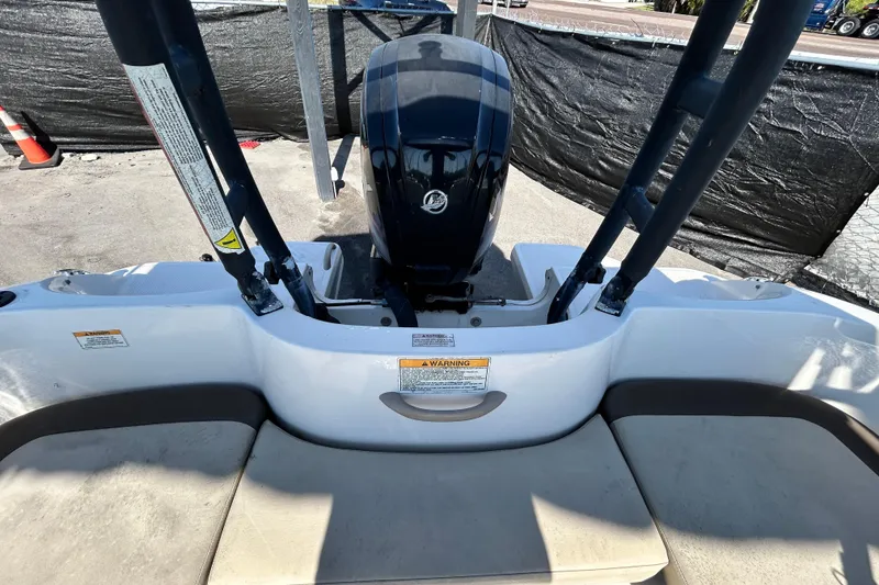 Slide: The Image of 2017 Bayliner Element E16 boat with outboard motor and seating area. - 35