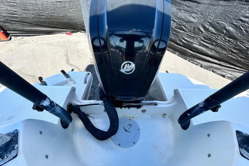 Slide: The Image of 2017 Bayliner Element E16 boat engine and stern view. - 37