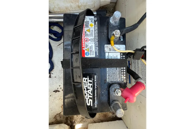 Slide: The Image of Battery compartment of a 2017 Bayliner Element E16 boat with Super Start battery. - 41