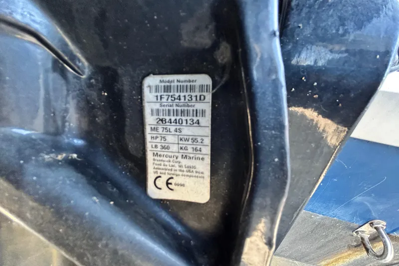 Slide: The Image of Label on a 2017 Bayliner Element E16 boat, displaying model and serial numbers. - 43