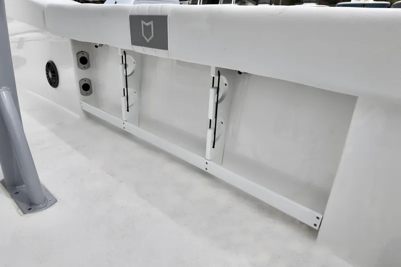 Slide: The Image of 2026 Sea Fox 248 Commander boat interior detail, showcasing storage compartments and speaker. - 11