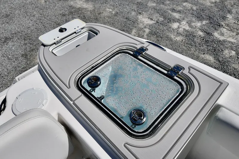 Slide: The Image of 2026 Sea Fox 248 Commander boat detail, featuring a sleek, modern livewell with a transparent lid. - 3
