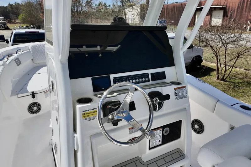 Slide: The Image of 2026 Sea Fox 248 Commander boat console with steering wheel and control panel. - 6