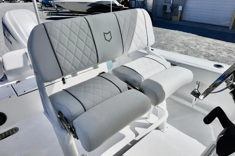 Slide: The Image of 2026 Sea Fox 248 Commander boat seating with quilted upholstery and sleek design. - 7