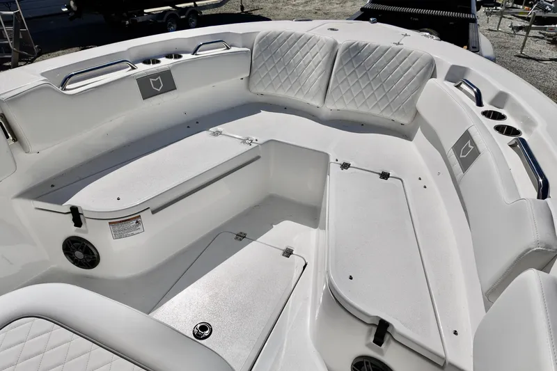 Slide: The Image of 2026 Sea Fox 248 Commander boat interior with cushioned seating and storage compartments. - 8