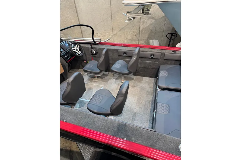 Slide: The Image of Interior of 2026 Starweld 18 SXT boat with seating and steering console. - 15
