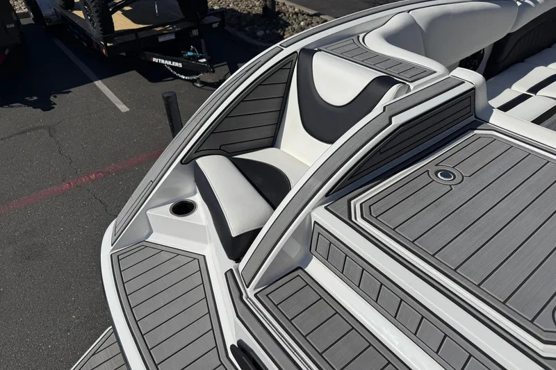 Slide: The Image of 2025 MB B52 25 Alpha boat interior with sleek seating and modern design. - 15