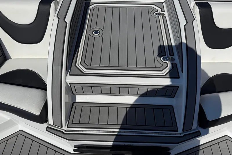 Slide: The Image of 2025 MB B52 25 Alpha boat interior with sleek seating and modern design. - 16