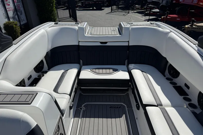 Slide: The Image of Interior of 2025 MB B52 25 Alpha boat with sleek seating and modern design. - 24