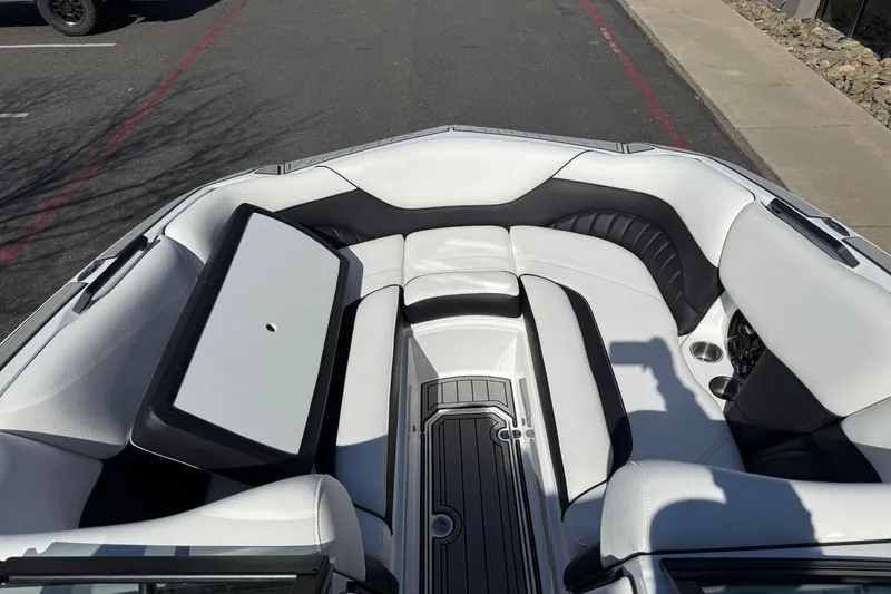 Slide: The Image of 2025 MB B52 25 Alpha boat interior with white and black seating. - 30