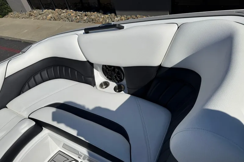 Slide: The Image of Luxurious seating in 2025 MB B52 25 Alpha boat with cup holders and speaker. - 31