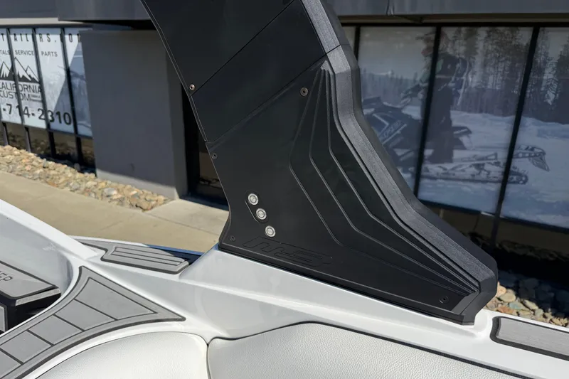 Slide: The Image of 2025 MB B52 25 Alpha boat detail with sleek black and white design elements. - 35