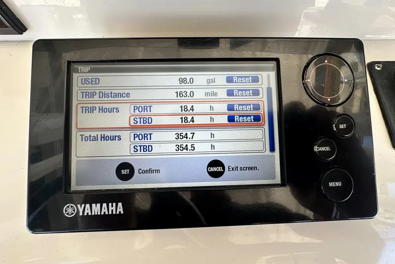 Slide: The Image of Yamaha display showing trip data: 98 gallons used, 163 miles traveled, 2018 Jupiter 26 FS. - 13