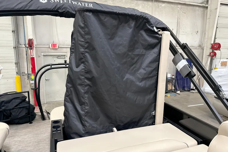 Slide: The Image of Godfrey Sweetwater 2286 SFLC 2026 with black canopy in warehouse. - 12