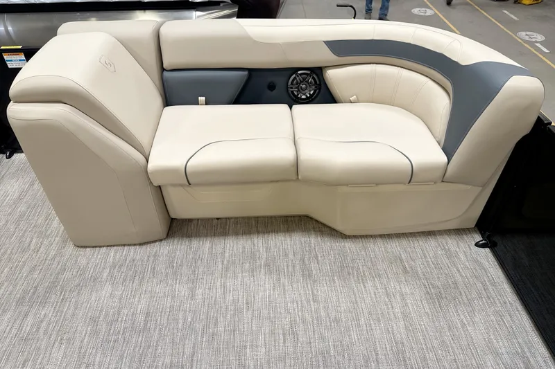 Slide: The Image of Interior of 2026 Godfrey Sweetwater 2286 SFLC with beige seating area. - 13