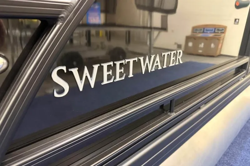 Slide: The Image of Close-up of "Sweetwater" logo on 2026 Godfrey Sweetwater 2286 SFLC boat. - 22