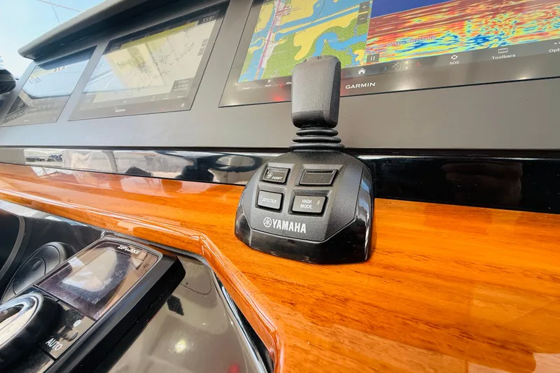 Slide: The Image of Yamaha control panel on 2021 Everglades 395 Center Console boat with Garmin displays. - 26